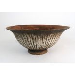•WAISTEL COOPER (1921-2003) A STONEWARE FOOTED BOWL with sgraffito decoration on iron and cream