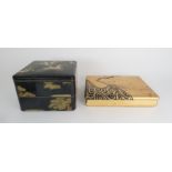 A JAPANESE LACQUERED BOX with two sections, painted with two storks amongst pine trees, 15cm high,