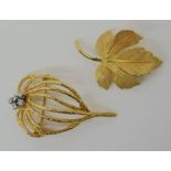 TWO 9CT GOLD RETRO BROOCHES an openwork leaf design set with diamonds, dimensions 4.5cm x 2.6cm,