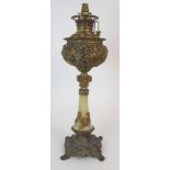 AN AMERICAN ONYX AND BRASS MILLER OIL LAMP inscribed The Miller Lamp, 64cm high Condition Report: