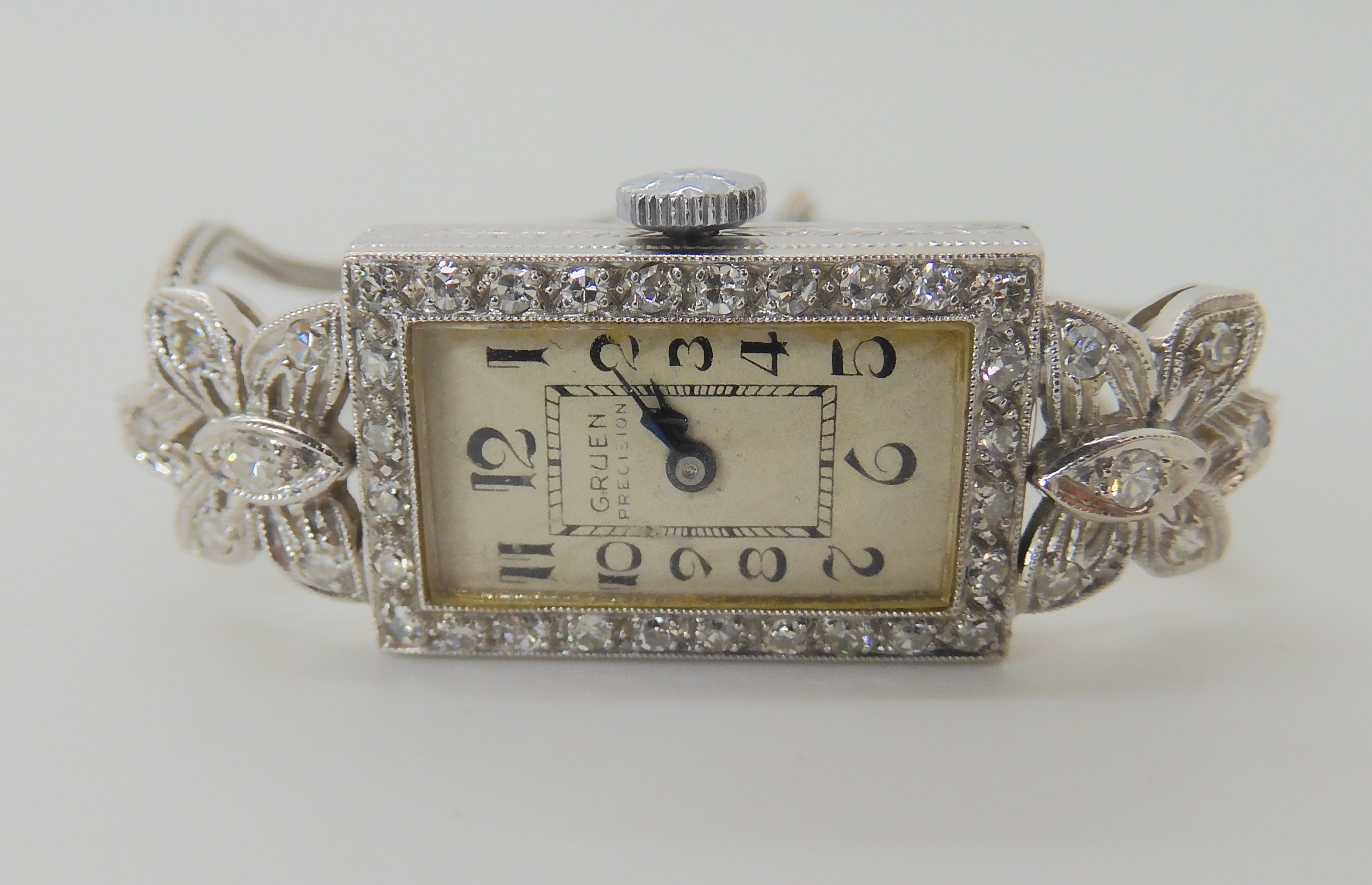 AN 18CT PLATINUM AND DIAMOND GRUEN COCKTAIL WATCH set with eight cut diamonds to the engraved - Bild 3 aus 6