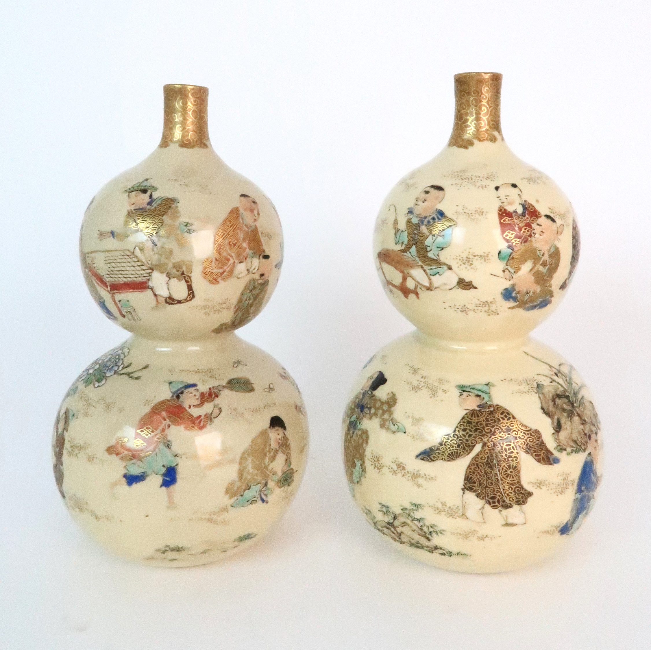 A PAIR OF SATSUMA DOUBLE GOURD VASES each painted with figures playing in gardens, with red and gilt - Image 2 of 12