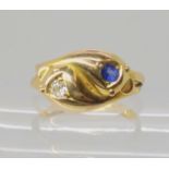 AN 18CT GOLD SAPPHIRE AND DIAMOND SNAKE RING set with a 0.05ct old cut with a comparably sized