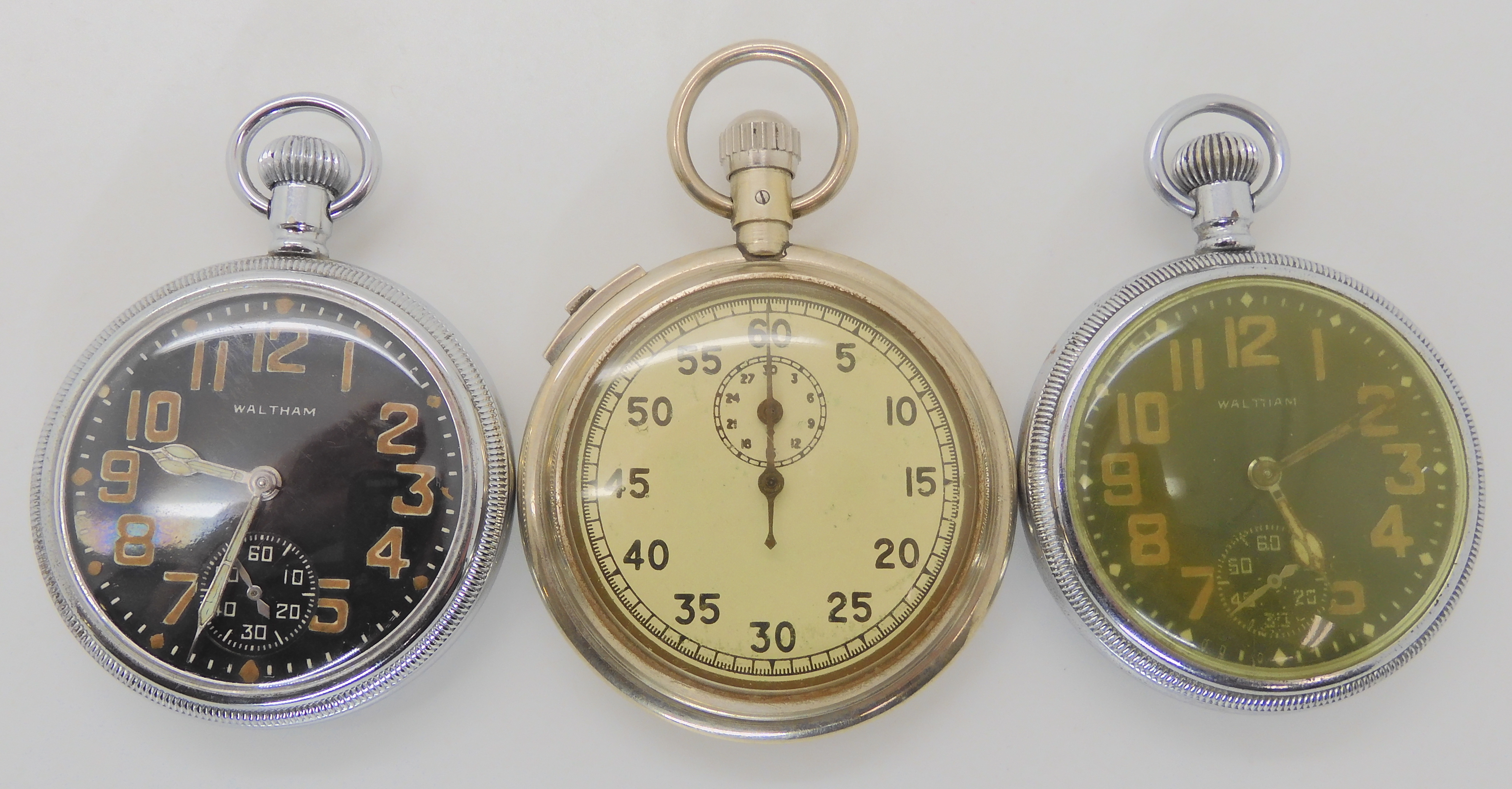 TWO MILITARY WALTHAM POCKET WATCHES AND A STOP WATCH the first with black dial subsidiary seconds