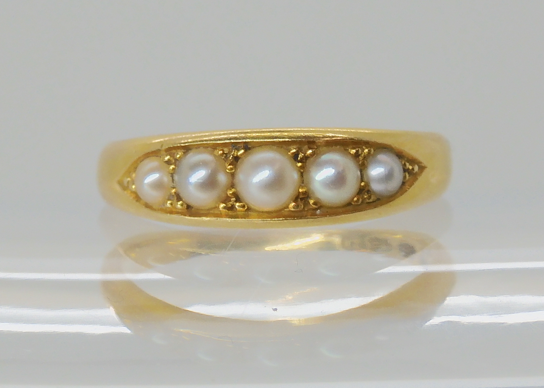 AN 18CT GOLD FIVE PEARL RING with nice crisp hallmarks for Birmingham 1892, made by W. Shammon &