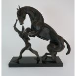 •SOPHIE DICKENS (BRITISH B. 1966) A STYLISED BRONZE SCULPTURE OF A REARING HORSE AND FIGURE