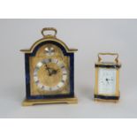 A MAPPIN AND WEBB MINIATURE BRASS, GLASS AND LAPIS LAZULI CARRIAGE CLOCK the white dial with Roman