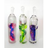 •JANE CHARLES (b. 1961) - THREE HEAVY GLASS SCENT BOTTLES each with swirling colourful internal