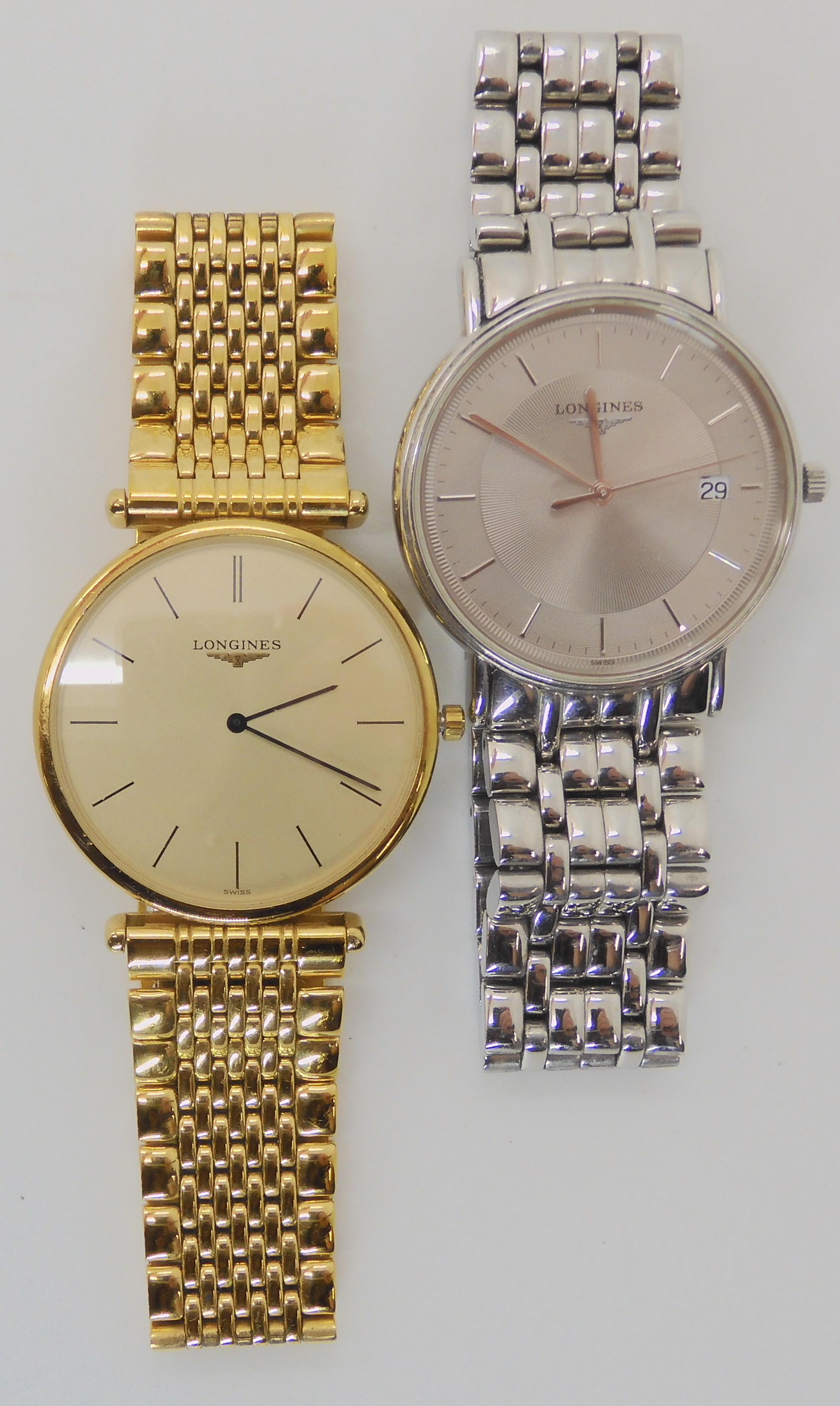 TWO LONGINES WATCHES a slim gold tone La Grande Classique de longines 28970852, diameter 3.2cm,