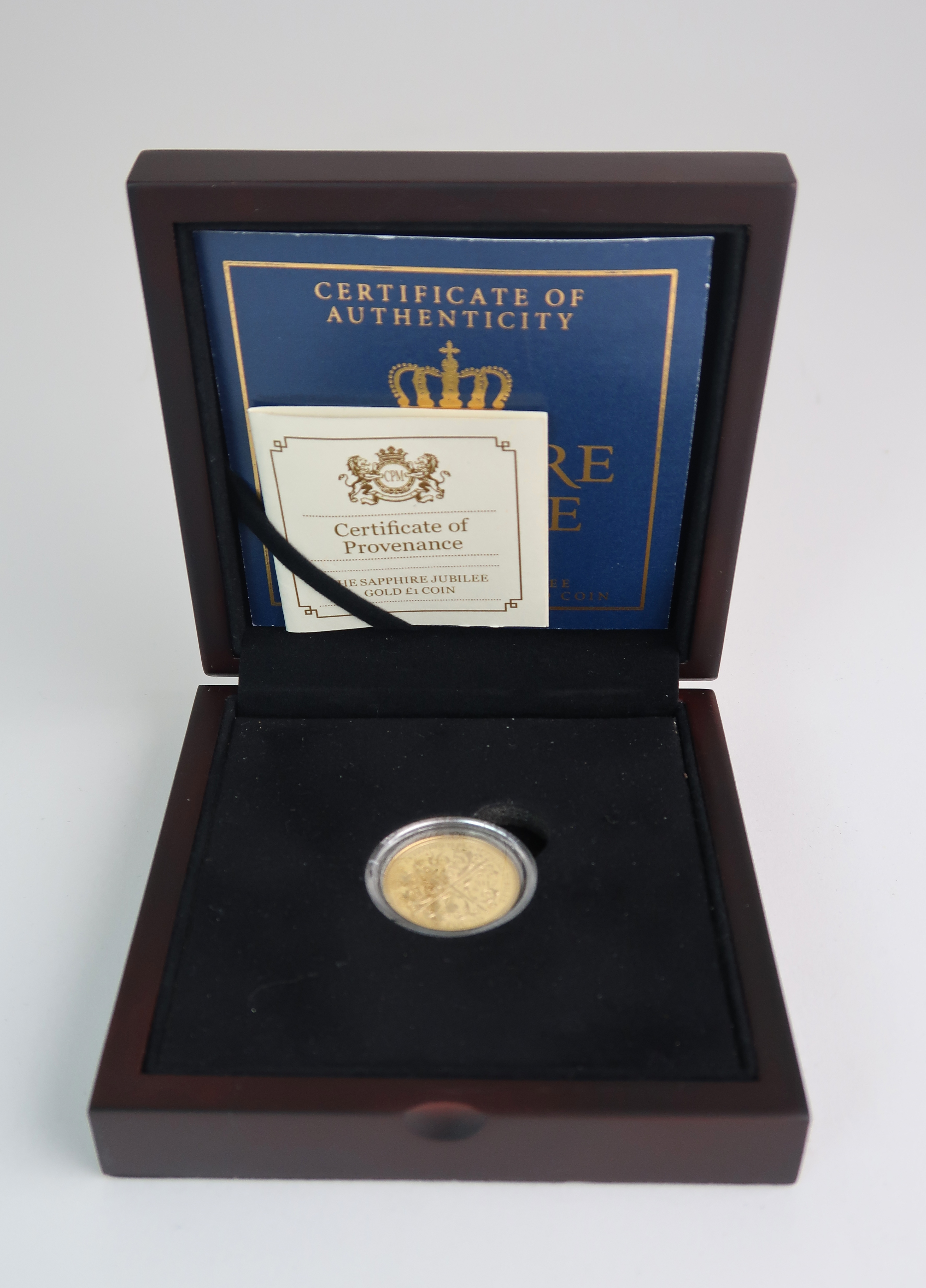 A CASED SAPPHIRE JUBILEE 1952 - 2017 GOLD PROOF ONE POUND COIN Condition Report: Available upon