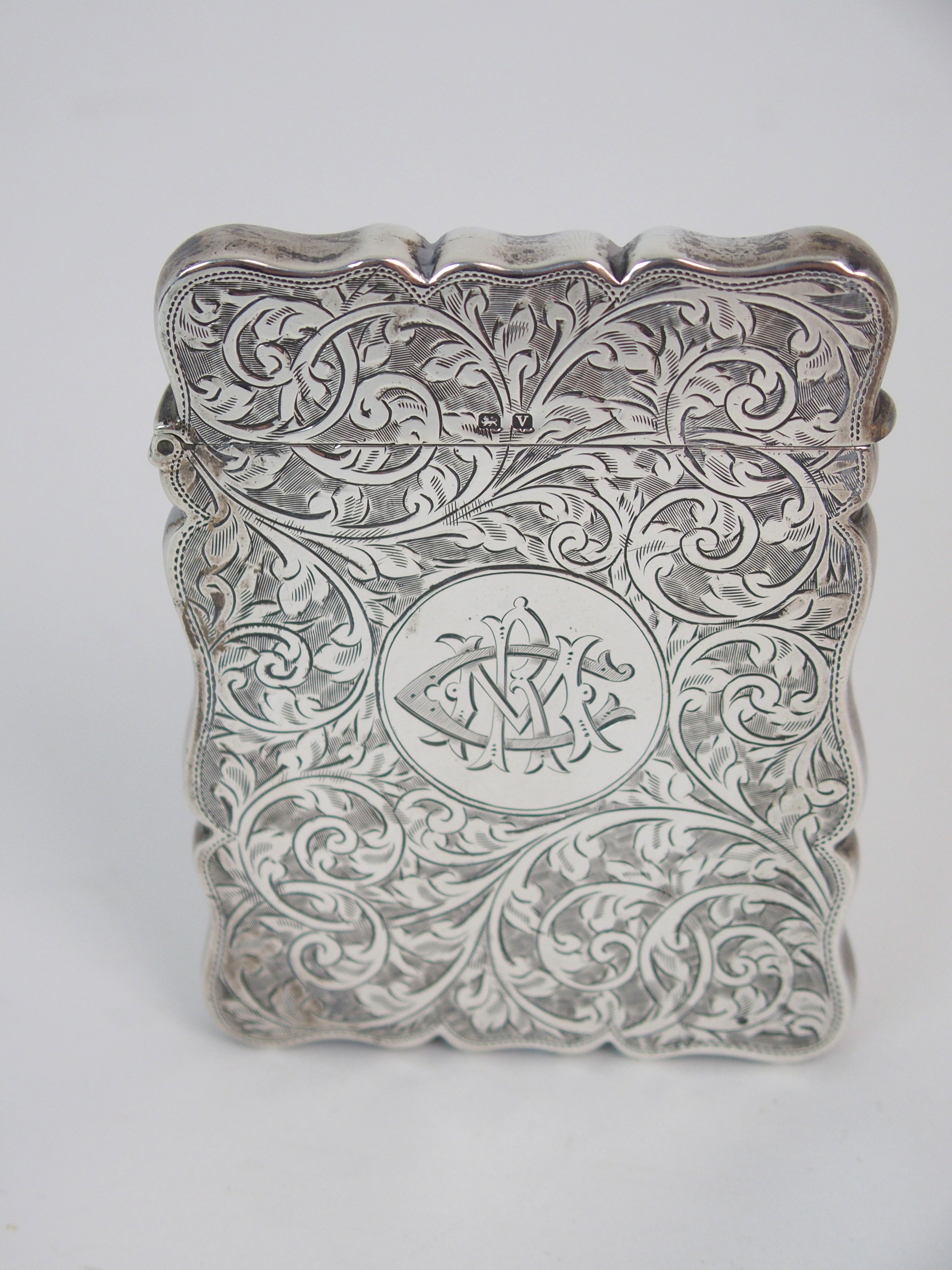 A SILVER CARD CASE by Robert Chandler, Birmingham 1920, of rectangular shape with engraved foliate - Image 2 of 7