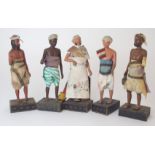 TEN INDIAN PAINTED WOOD FIGURES each native figure standing and wearing traditional dress, mounted