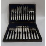 A CASED TWENTY-FOUR PIECE EPNS AND MOTHER OF PEARL HANDLED FISH CUTLERY another cased twenty-seven