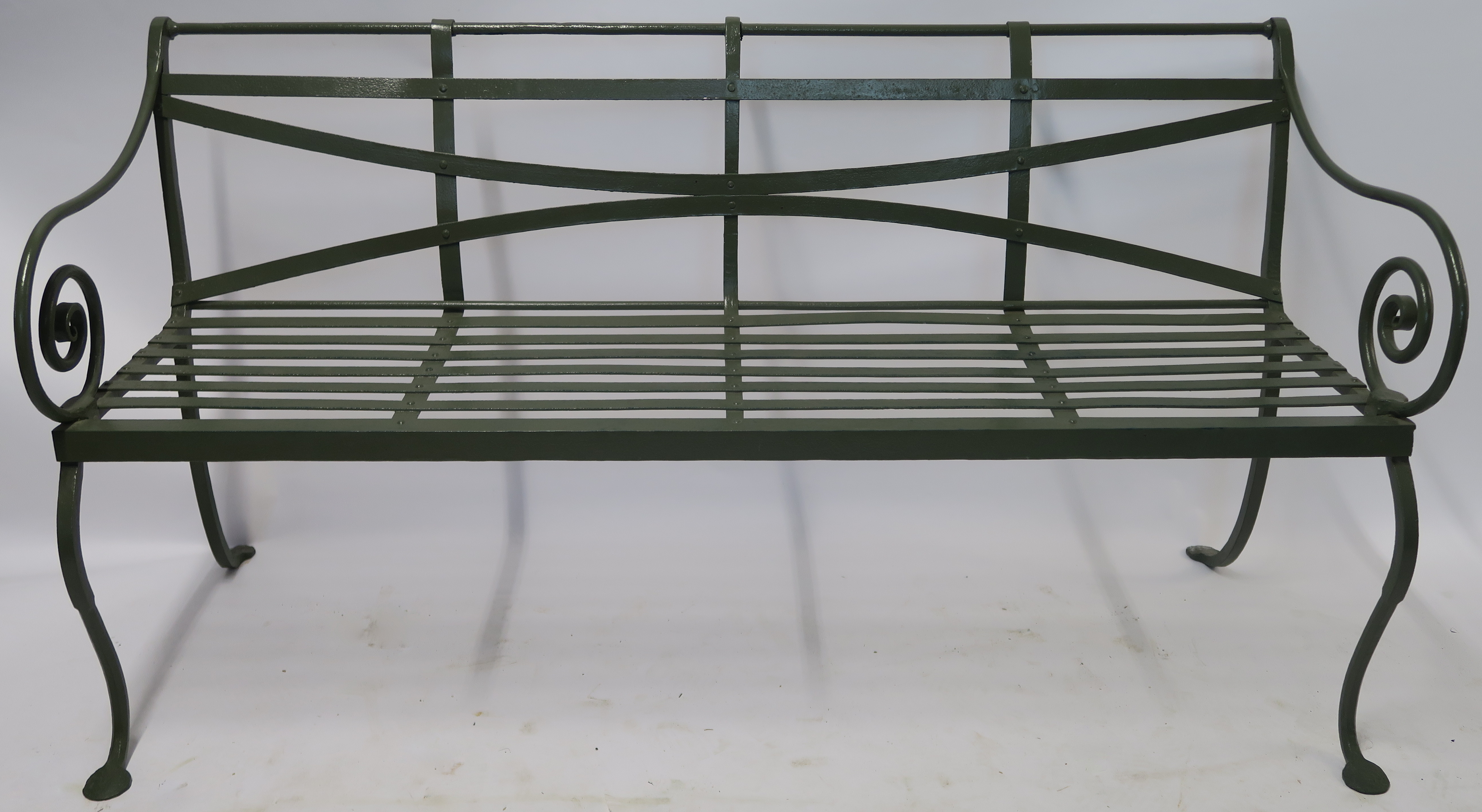 A PAINTED WROUGHT IRON GARDEN BENCH, 20th century, 84cm high,153cm wide and 56cm deep Condition