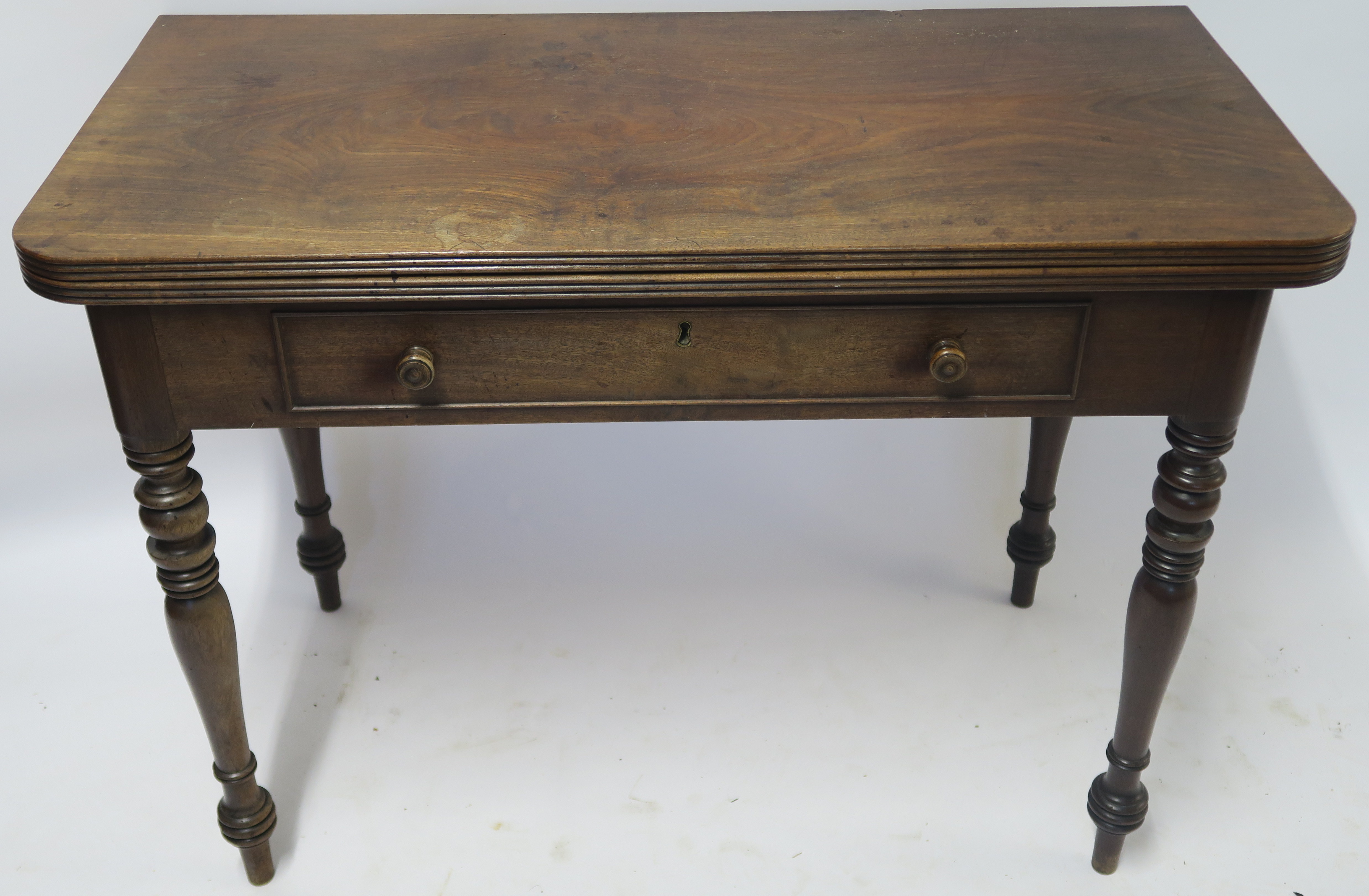 A VICTORIAN MAHOGANY FOLD OVER TEA TABLE 75cm high, 102cm wide and 50cm deep Condition Report: