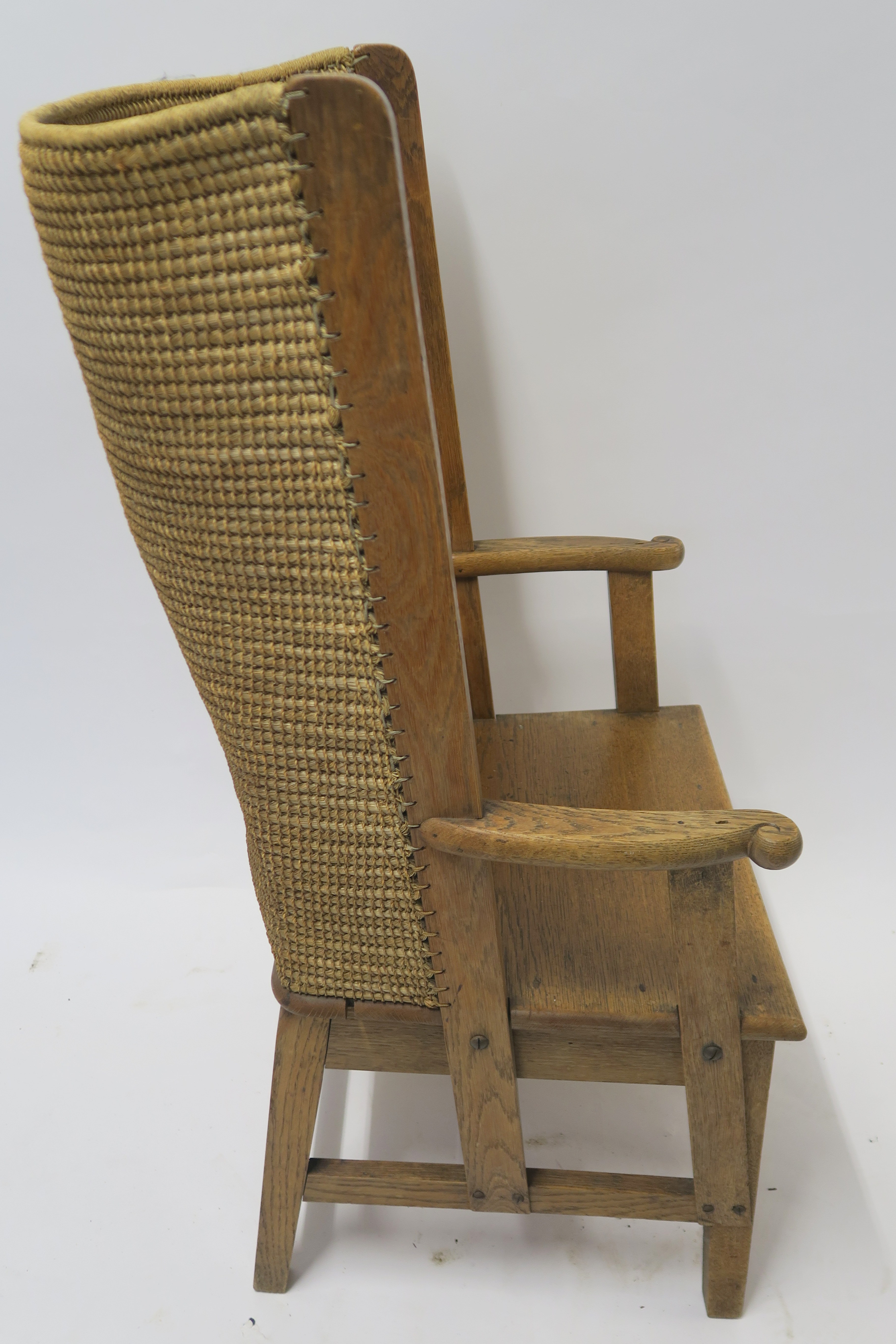AN ORKNEY OAK AND RUSH ARMCHAIR of standard form, 107cm high, 58cm wide and 55cm deep Condition - Image 5 of 8