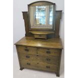 AN OAK ARTS AND CRAFTS DRESSING TABLE 158cm high , 100cm wide and 48cm deep Condition Report: