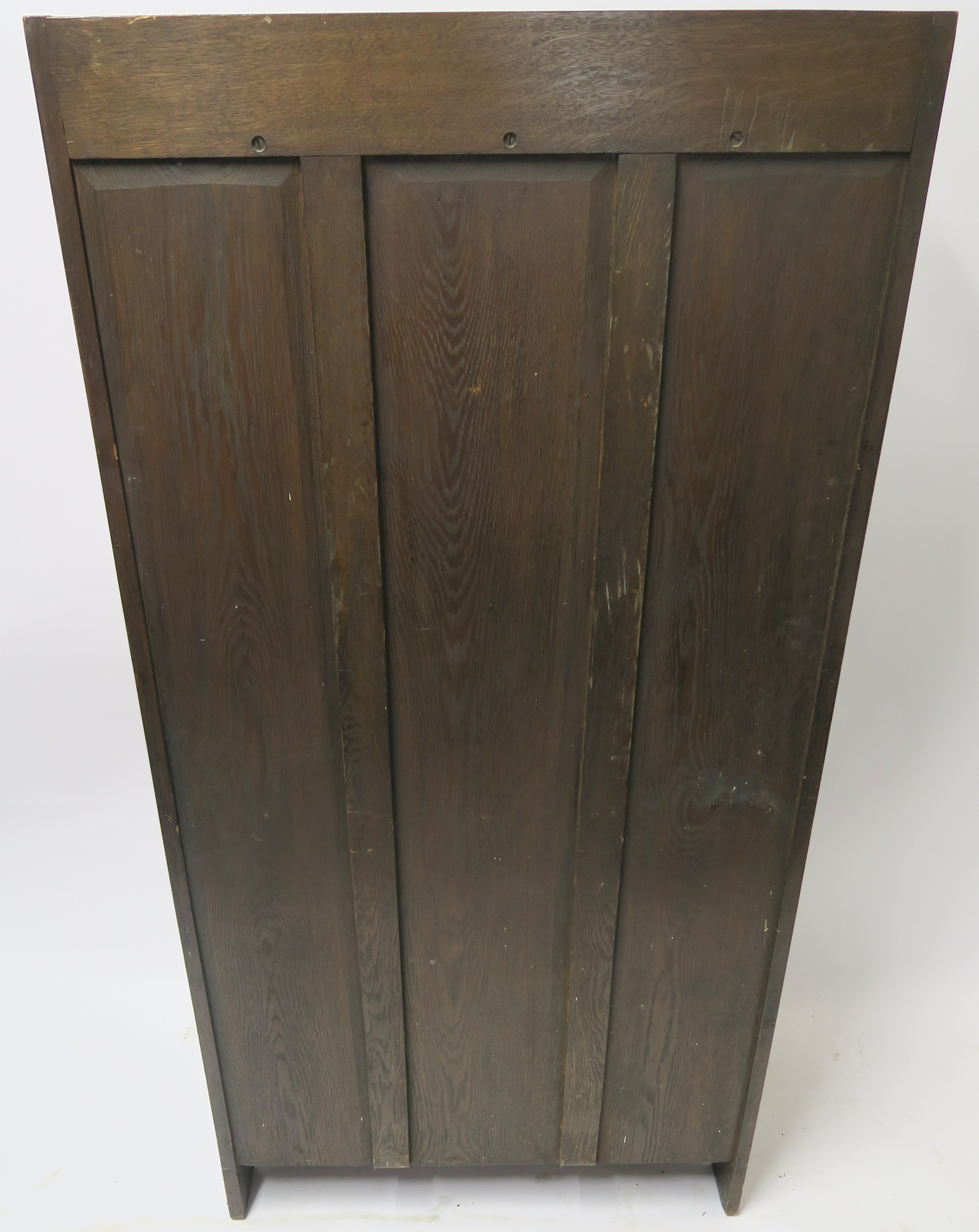 AN ARTS AND CRAFTS OAK WRITING DESK with a stained and leaded glass door and open shelves above a - Image 8 of 8