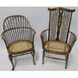 TWO FRUITWOOD WINDSOR ARMCHAIRS with cane seats 94cm and 81cm high (2) Condition Report: Available