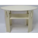 AN OVAL WHITE LACQUERED OCCASSIONAL TABLE after Charles Rennie Mackintosh, 61cm high, 93cm wide