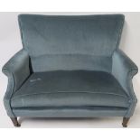 AN EDWARDIAN TWO SEATER SOFA, upholstered in a blue fabric, 102cm high,126cm wide and 80cm deep