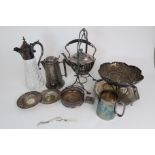 A SILVER-MOUNTED CLARET JUG, a kettle on stand, silver-plated ale jug, wine coaster,