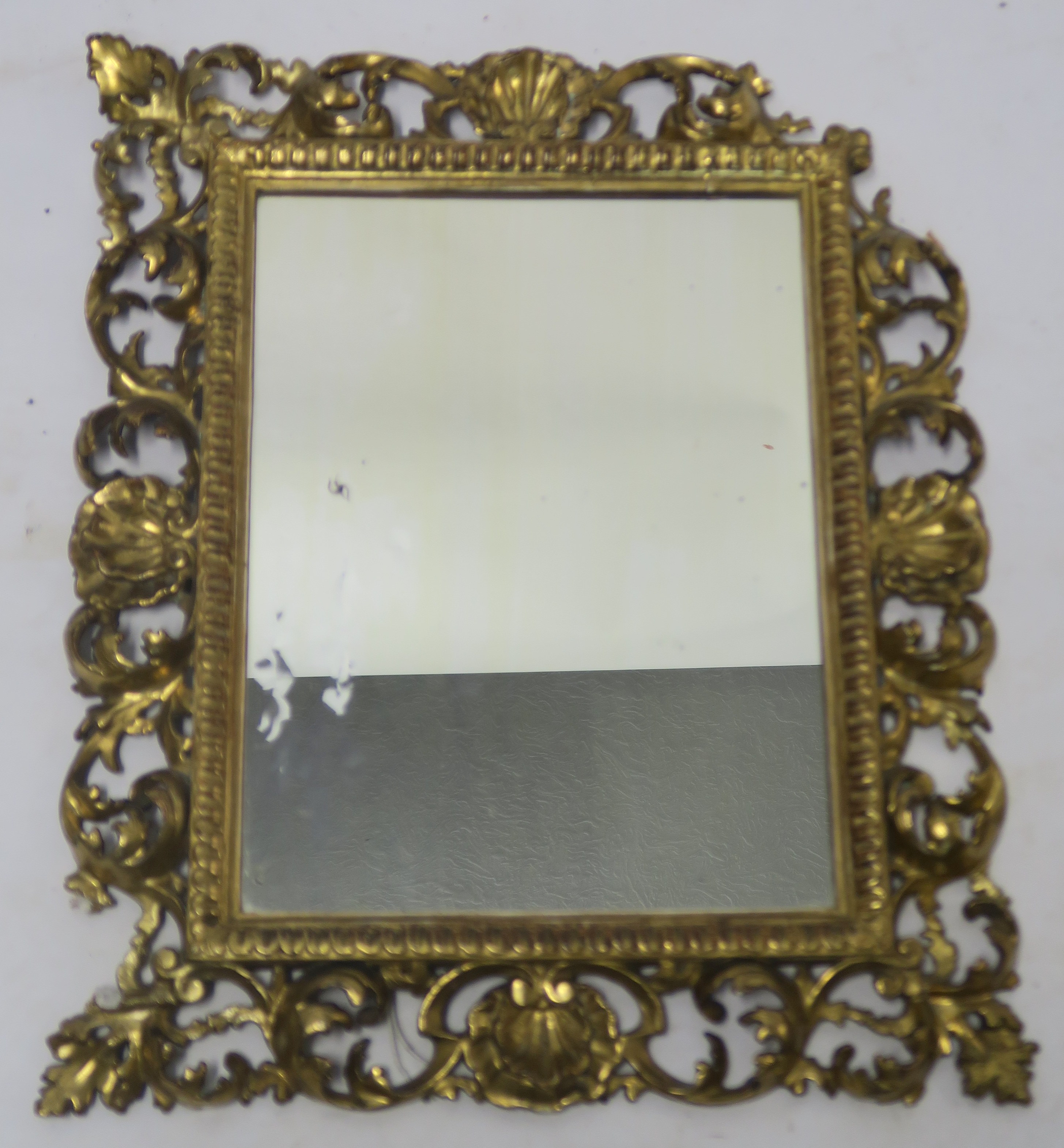 AN ITALIAN GILTWOOD WALL MIRROR, 60cm high x 51cm wide Condition Report: Available upon request