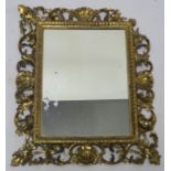 AN ITALIAN GILTWOOD WALL MIRROR, 60cm high x 51cm wide Condition Report: Available upon request