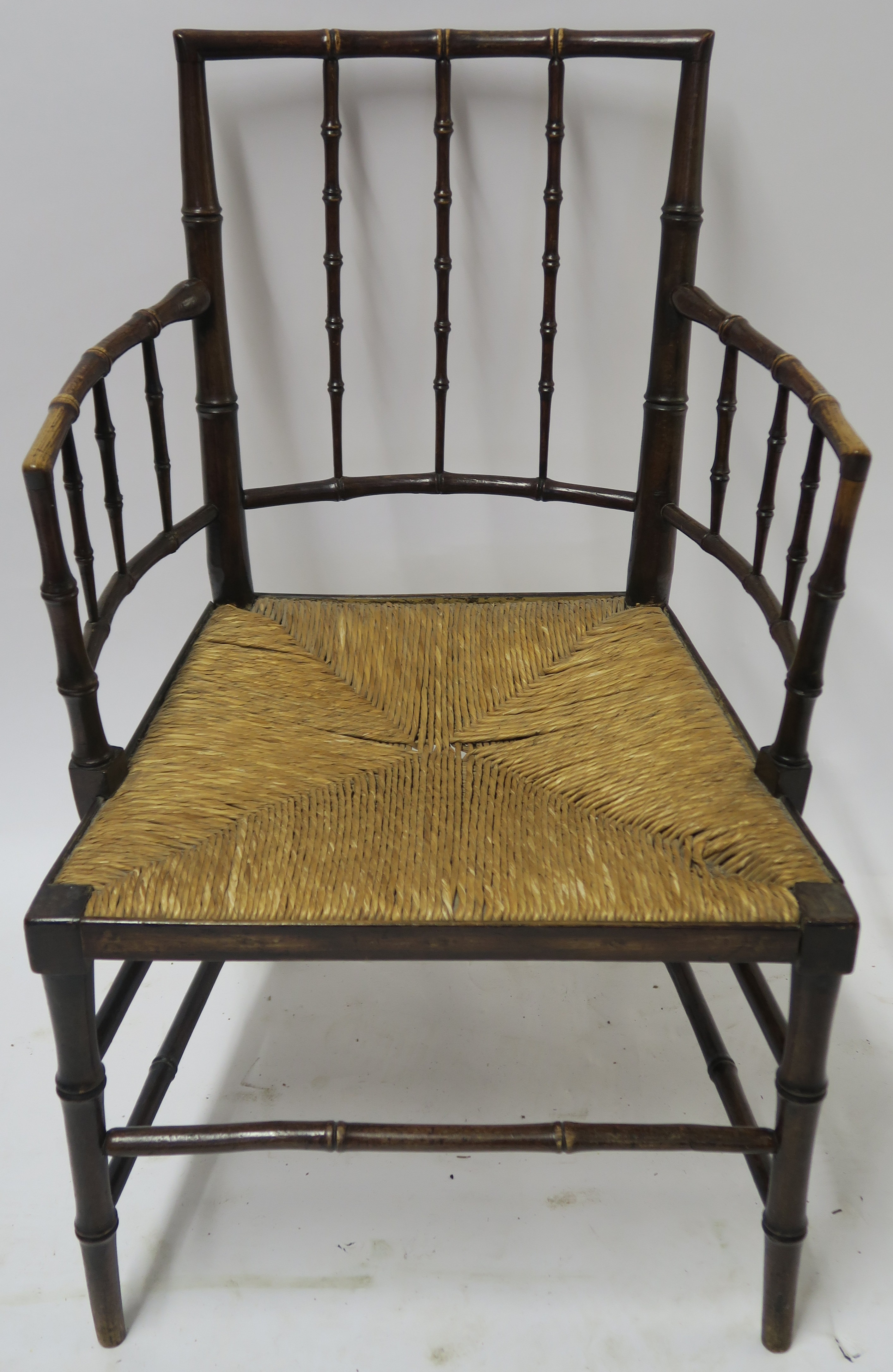 A WILLIAM MORRIS SUSSEX CHAIR of standard form with rush seat, 88cm high Condition Report: - Image 2 of 7