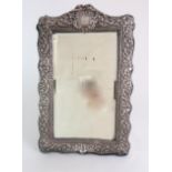 A LATE VICTORIAN SILVER-MOUNTED EASEL MIRROR with cartouche, monogrammed, CGB, Birmingham, 1900,