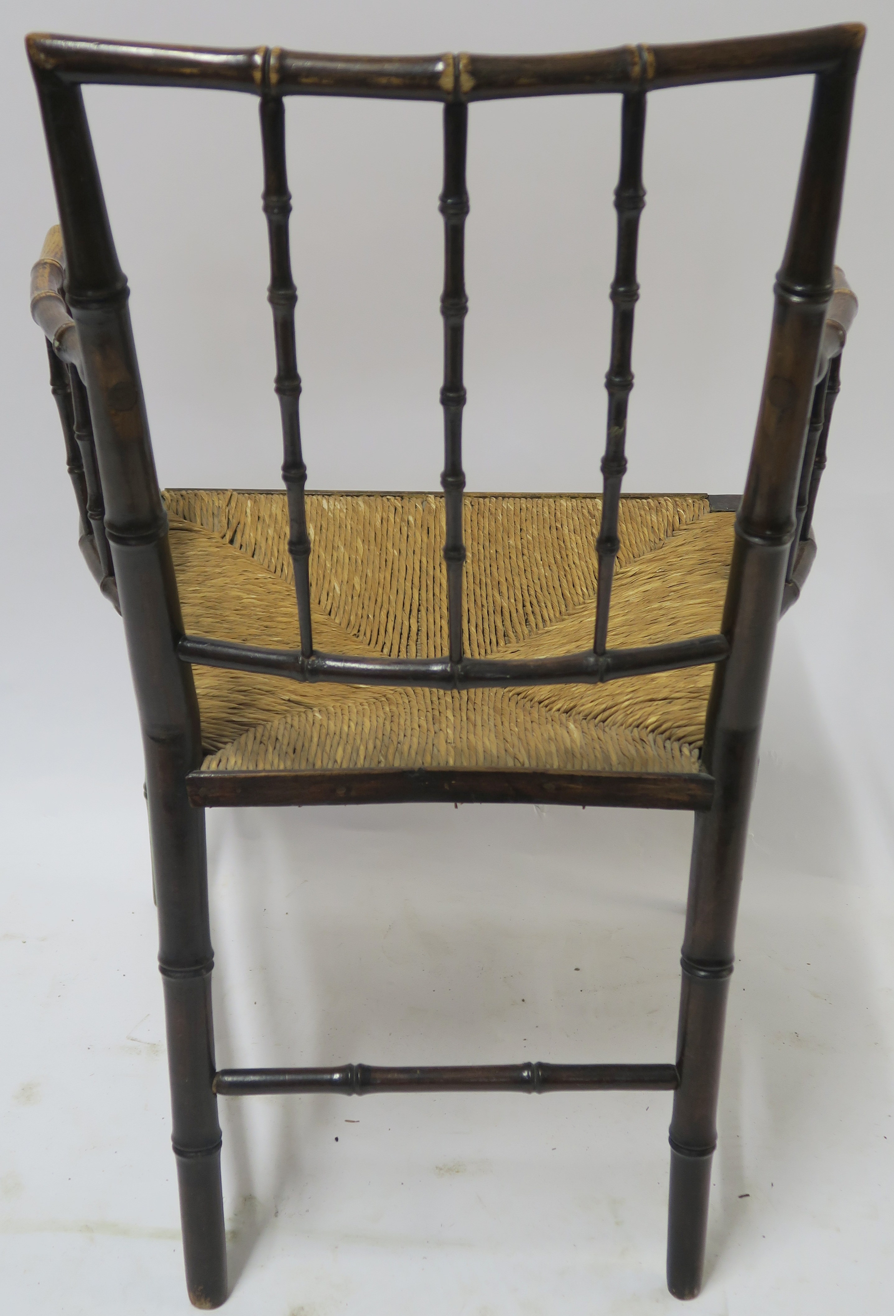 A WILLIAM MORRIS SUSSEX CHAIR of standard form with rush seat, 88cm high Condition Report: - Image 7 of 7