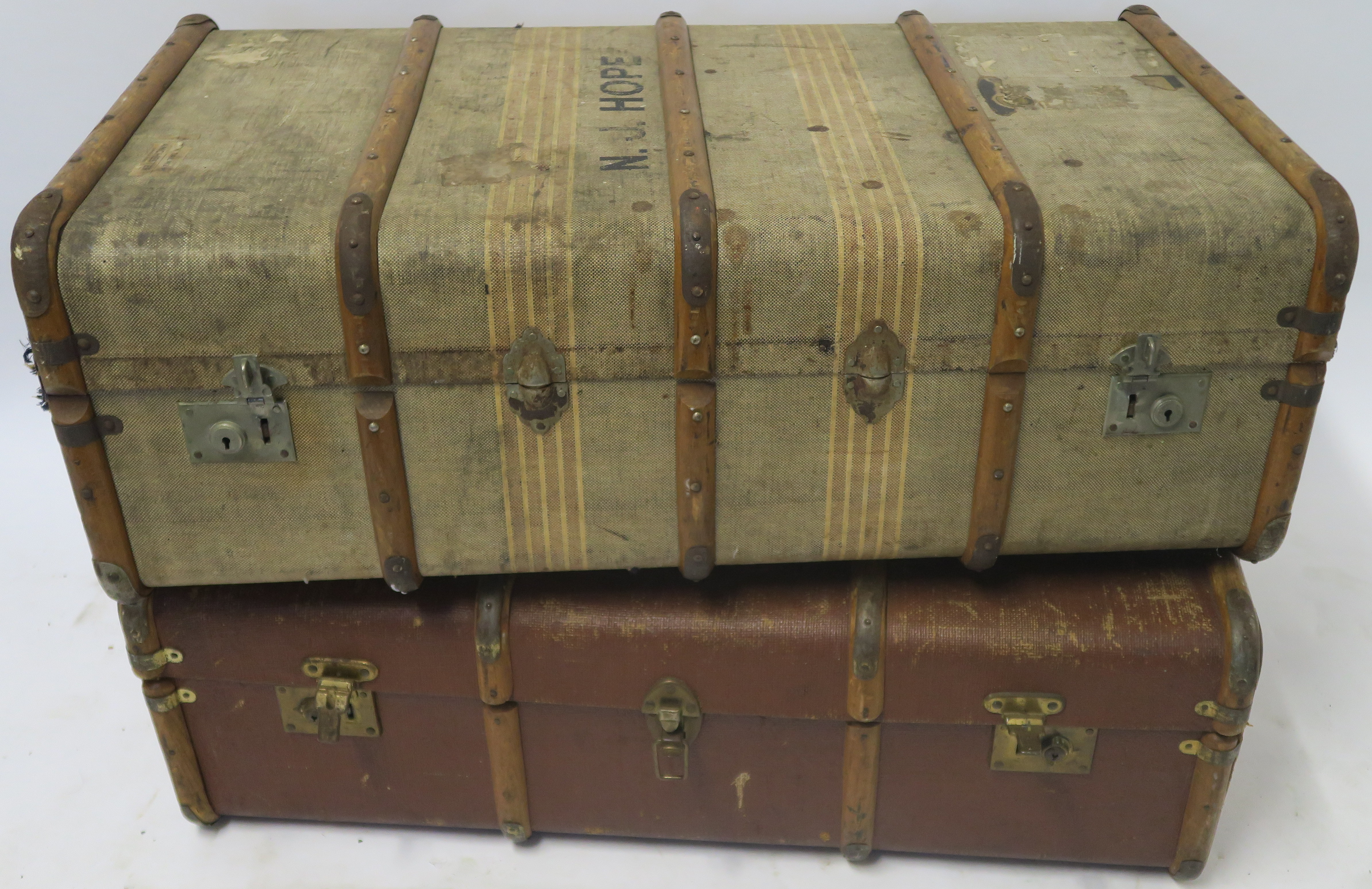 TWO WOOD BOUND CABIN TRUNKS early 20th century Condition Report: Available upon request