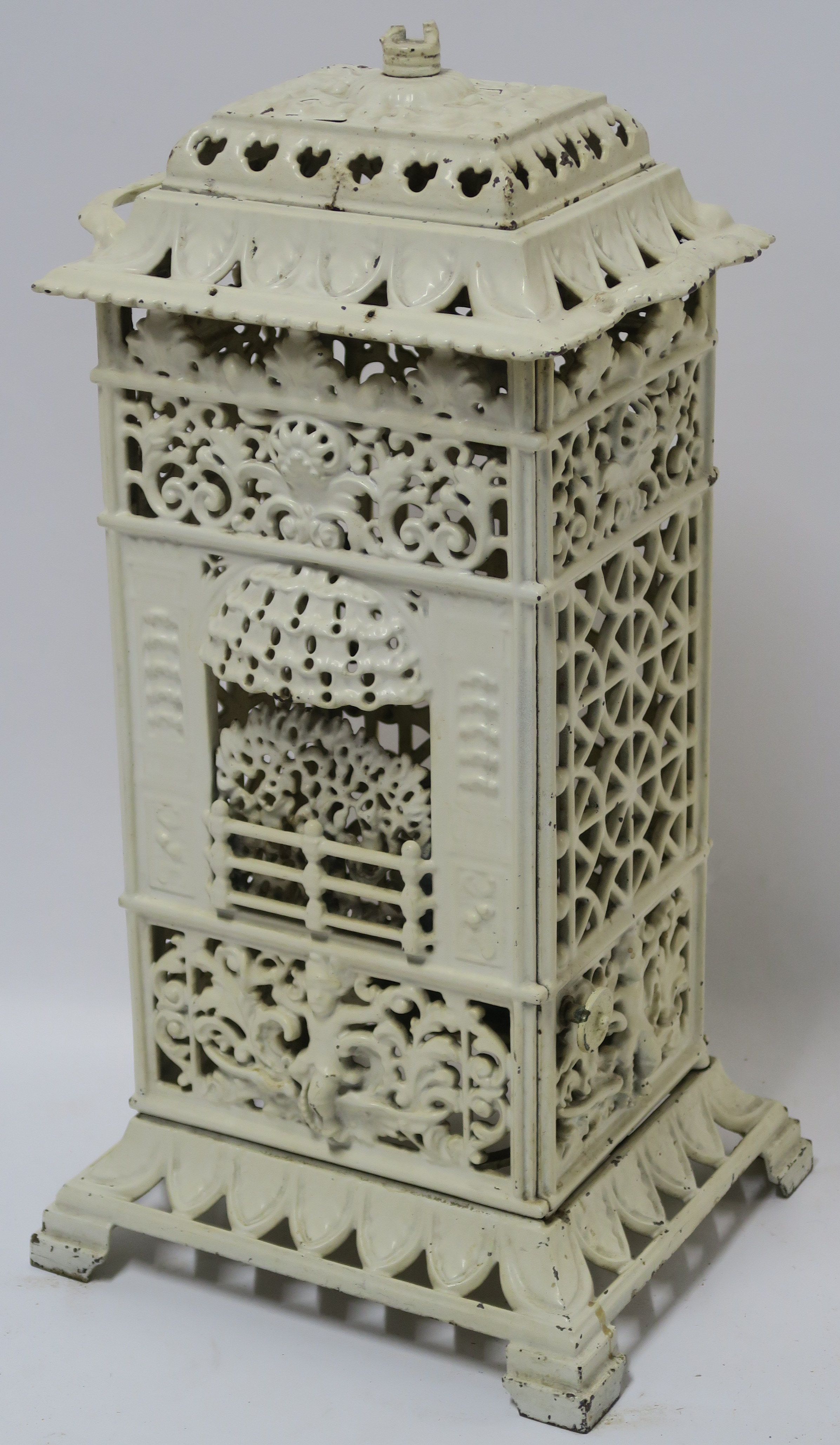 A CAST IRON ROOM HEATER, 63cm high, 33cm wide and 23cm deep Condition Report: Available upon