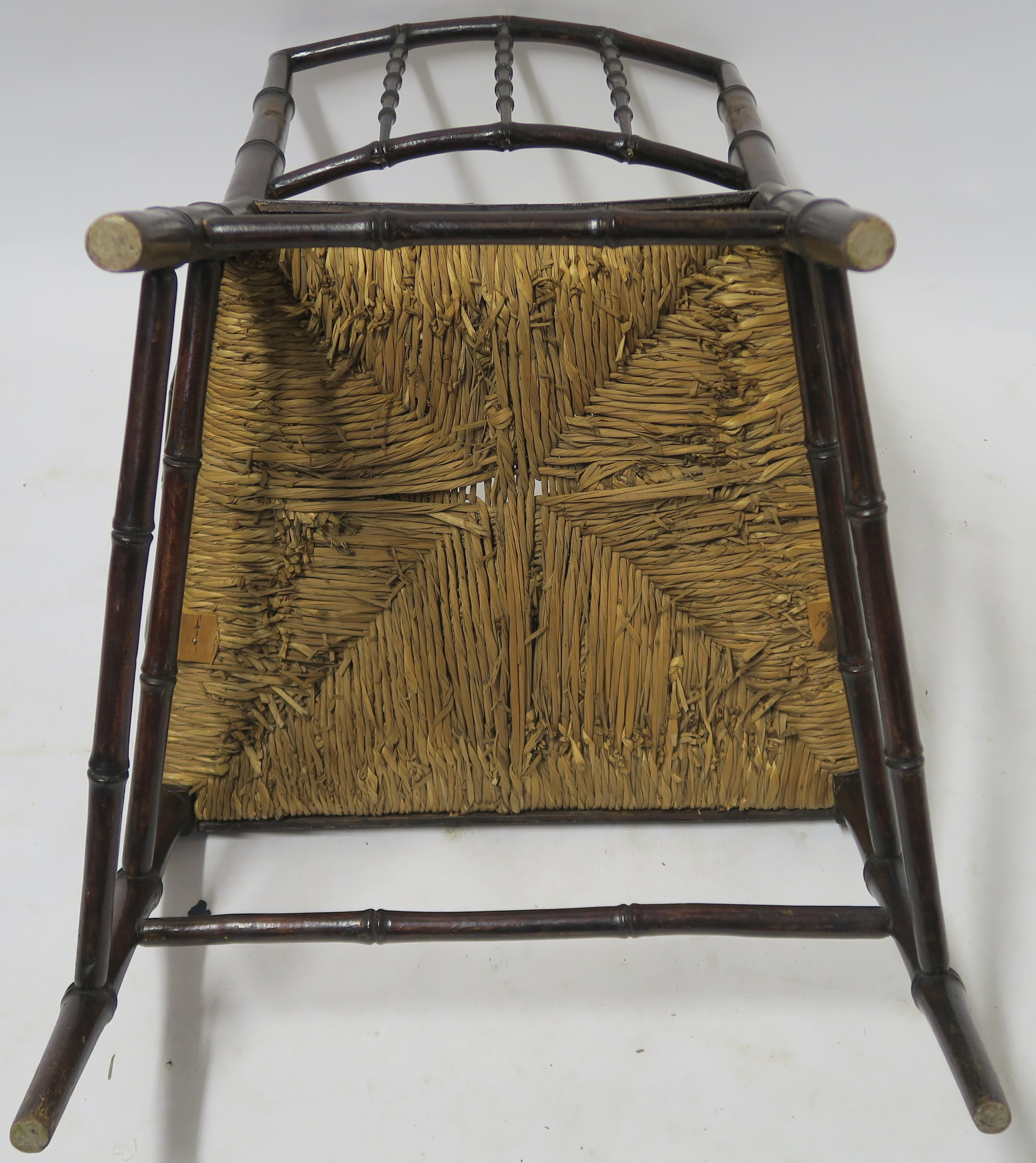 A WILLIAM MORRIS SUSSEX CHAIR of standard form with rush seat, 88cm high Condition Report: - Image 6 of 7