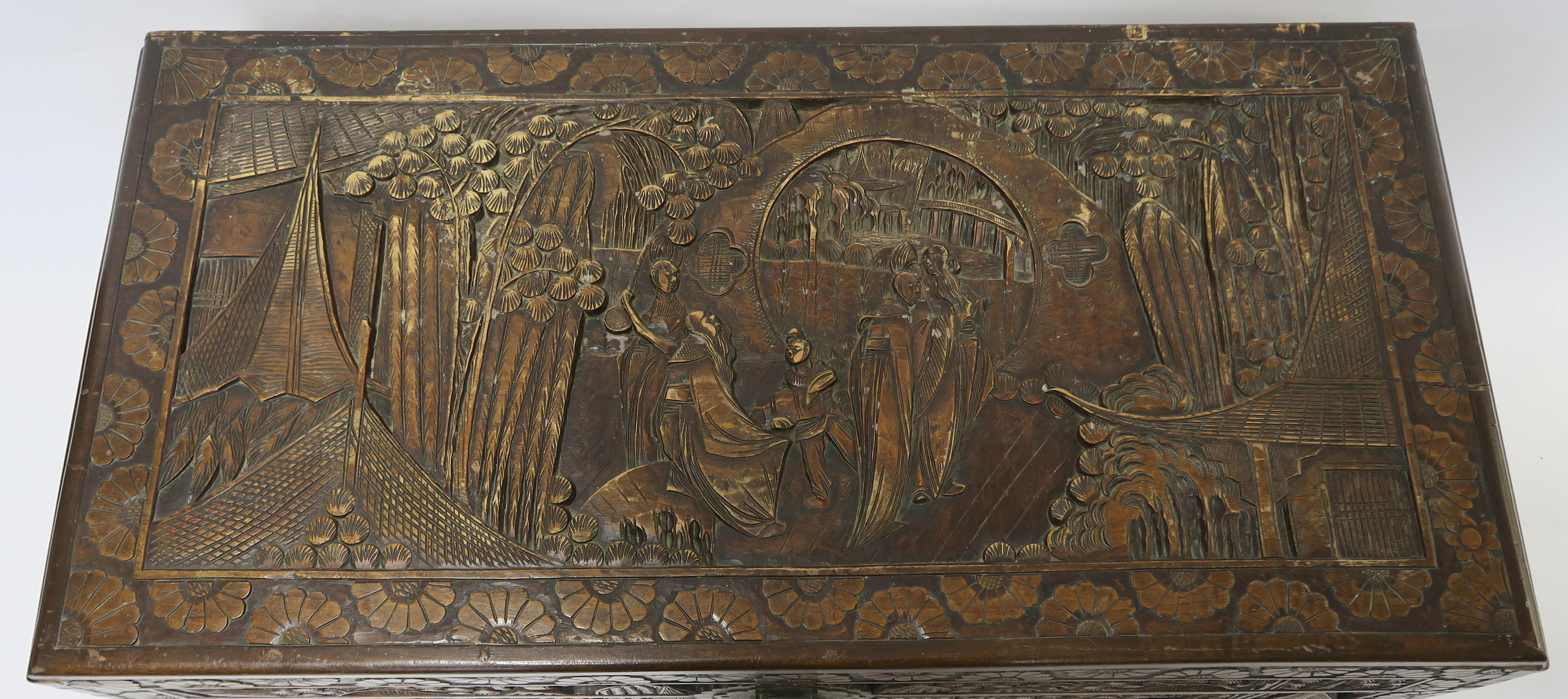 A CHINESE CAMPHOR WOOD CARVED BLANKET CHEST carved allover with figures in gardens, 59cm high, 105cm - Image 2 of 7