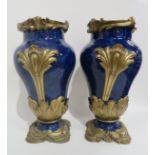 A PAIR OF FRENCH BLUE GLAZED AND GILT METAL MOUNTED VASES 41cm high Condition Report: Available upon