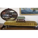 An upholstered fender footstool, 128cm long, a small stool and a wall mirror (3) Condition Report: