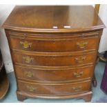 A reproduction mahogany bow front four drawer chest with bracket feet, 78cm high x 70cm wide x