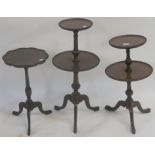 Two mahogany two tier wine tables with tripod base and a small mahogany wine table (3) Condition