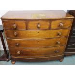 A 19th Century mahogany bow front three over three chest of drawers on turned feet, 101cm high x