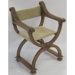 A reproduction mahogany X frame chair with suede seat and back Condition Report: Available upon