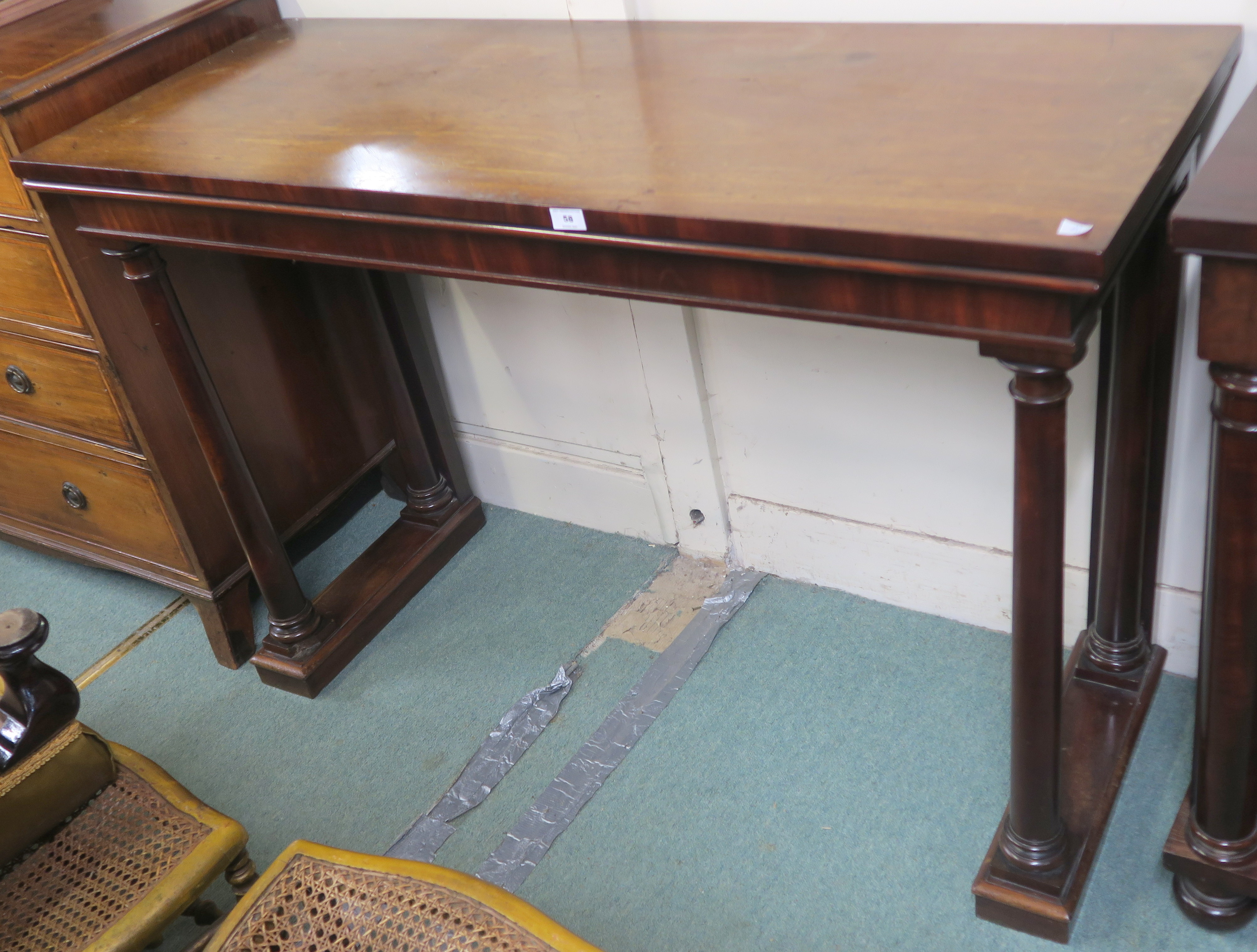 A Victorian mahogany hall table with column supports, 91cm high x 138cm wide x 53cm deep Condition