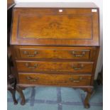 A walnut bureau with three drawers, 102cm high x 74cm wide x 42cm deep Condition Report: Available