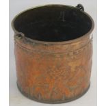 A decorated copper coal bucket, 32cm high x 34cm diameter Condition Report: Available upon request