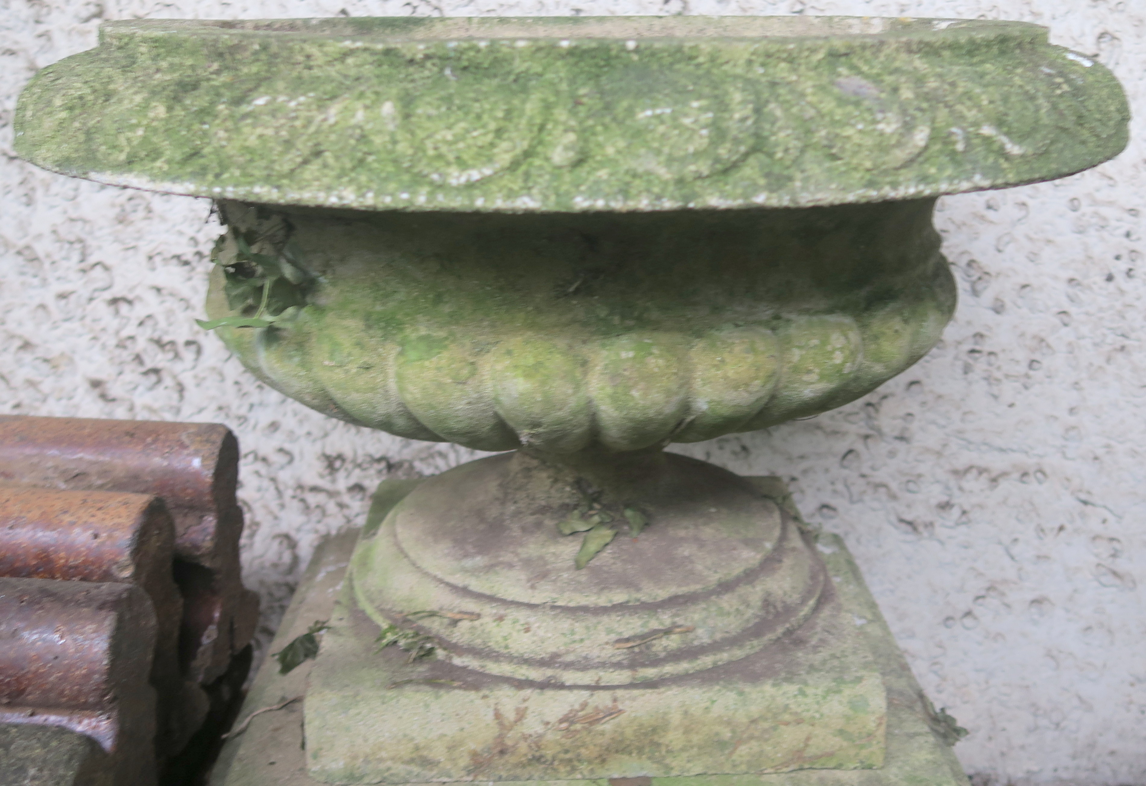 A large reconstituted stone urn on stand, 126cm high and a smaller urn on stand 71cm high (2) - Image 4 of 4