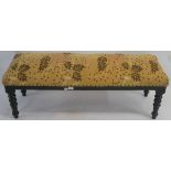 A long upholstered footstool, 46cm high x 122cm wide x 43cm deep Condition Report: Available upon