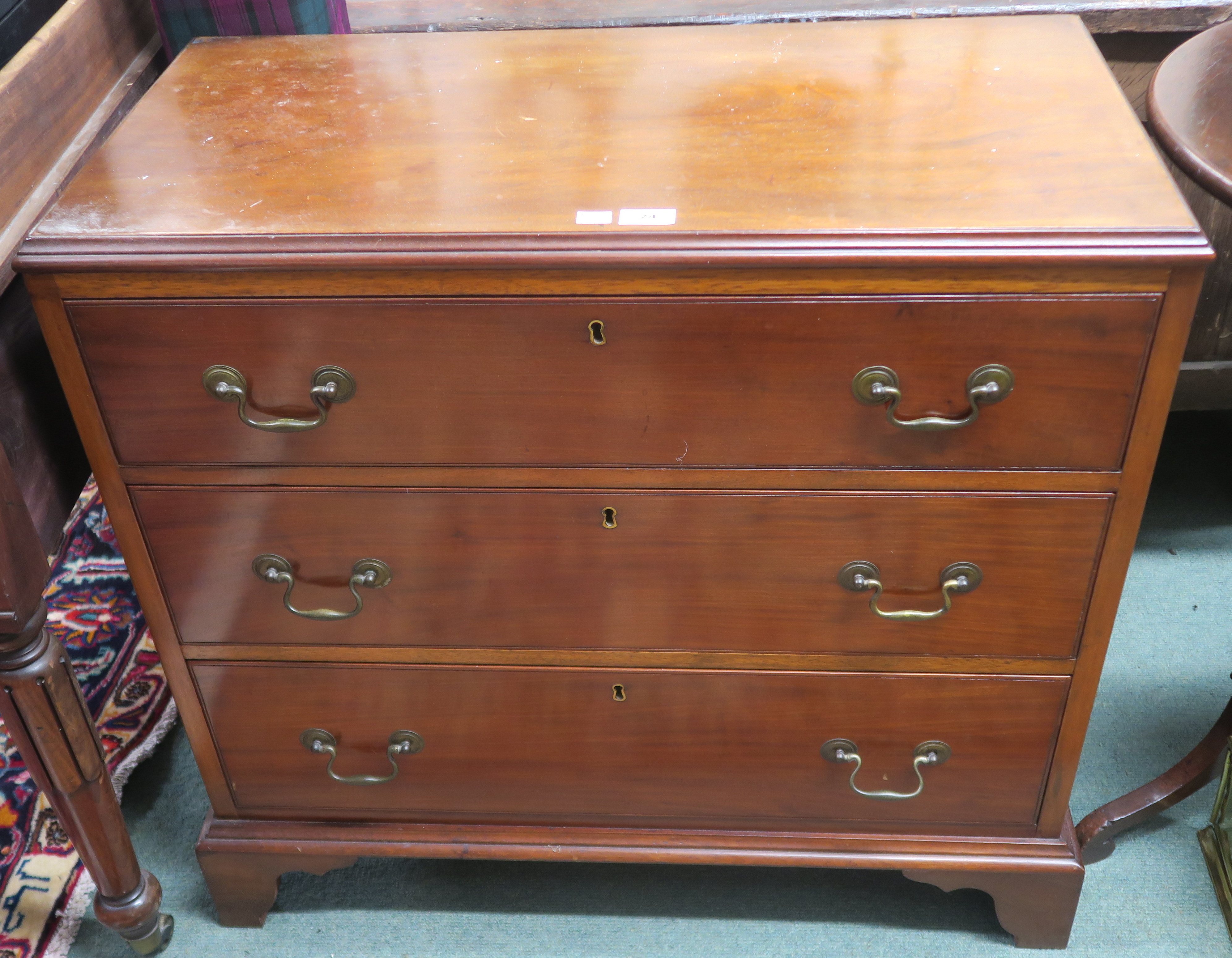 A mahogany three drawer chest on bracket feet, 79cm high x 82cm wide x 41cm deep Condition Report: