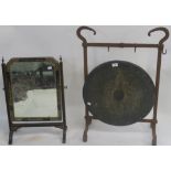 A gong with wrought iron stand and a mirror on stand (def) (2) Condition Report: Available upon