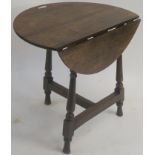 A Georgian oak table with drop leaf, 72cm high x 82cm wide x 57cm deep Condition Report: Available