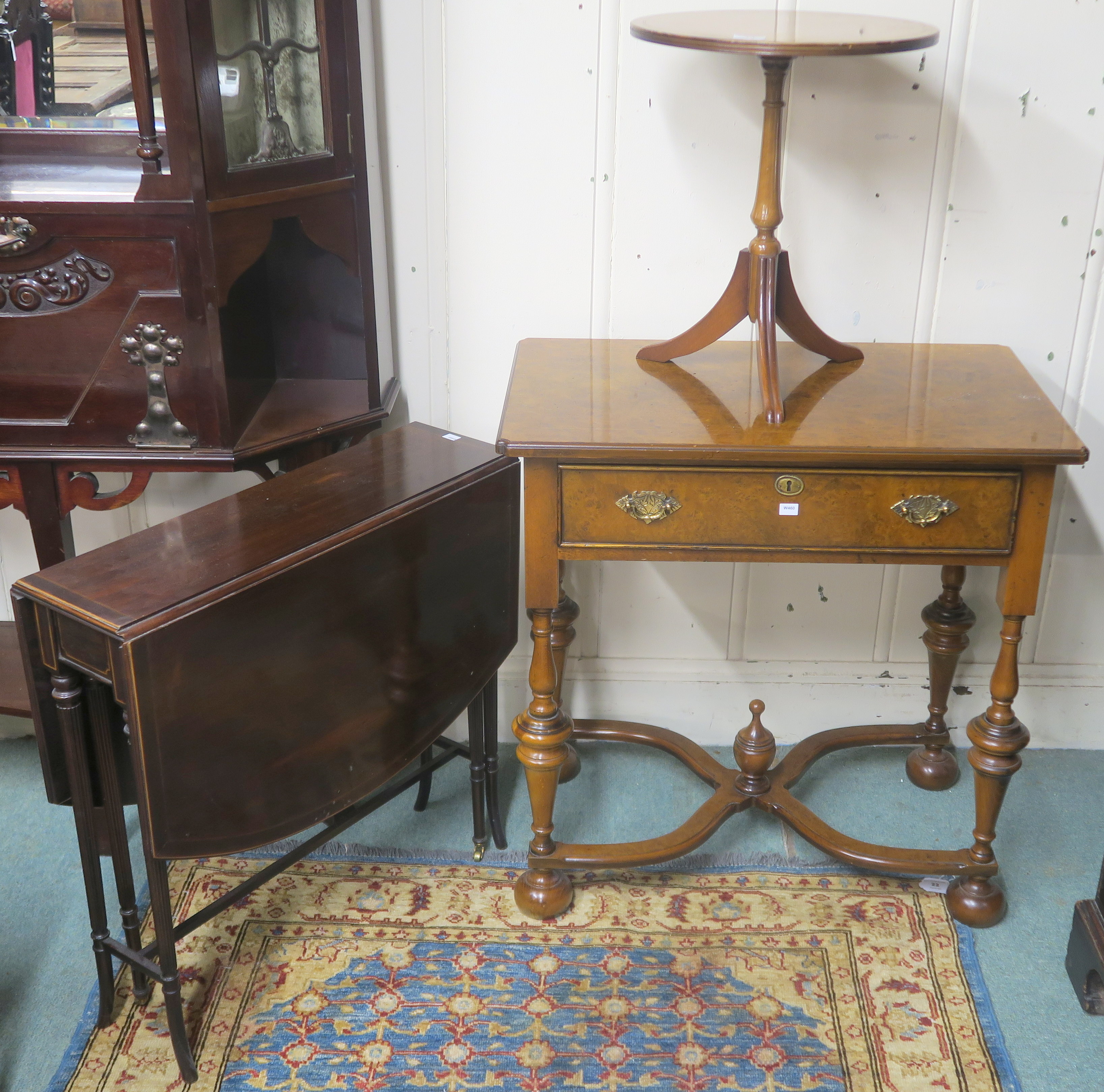 A small mahogany Sutherland table, a reproduction walnut side table with single drawer on cross